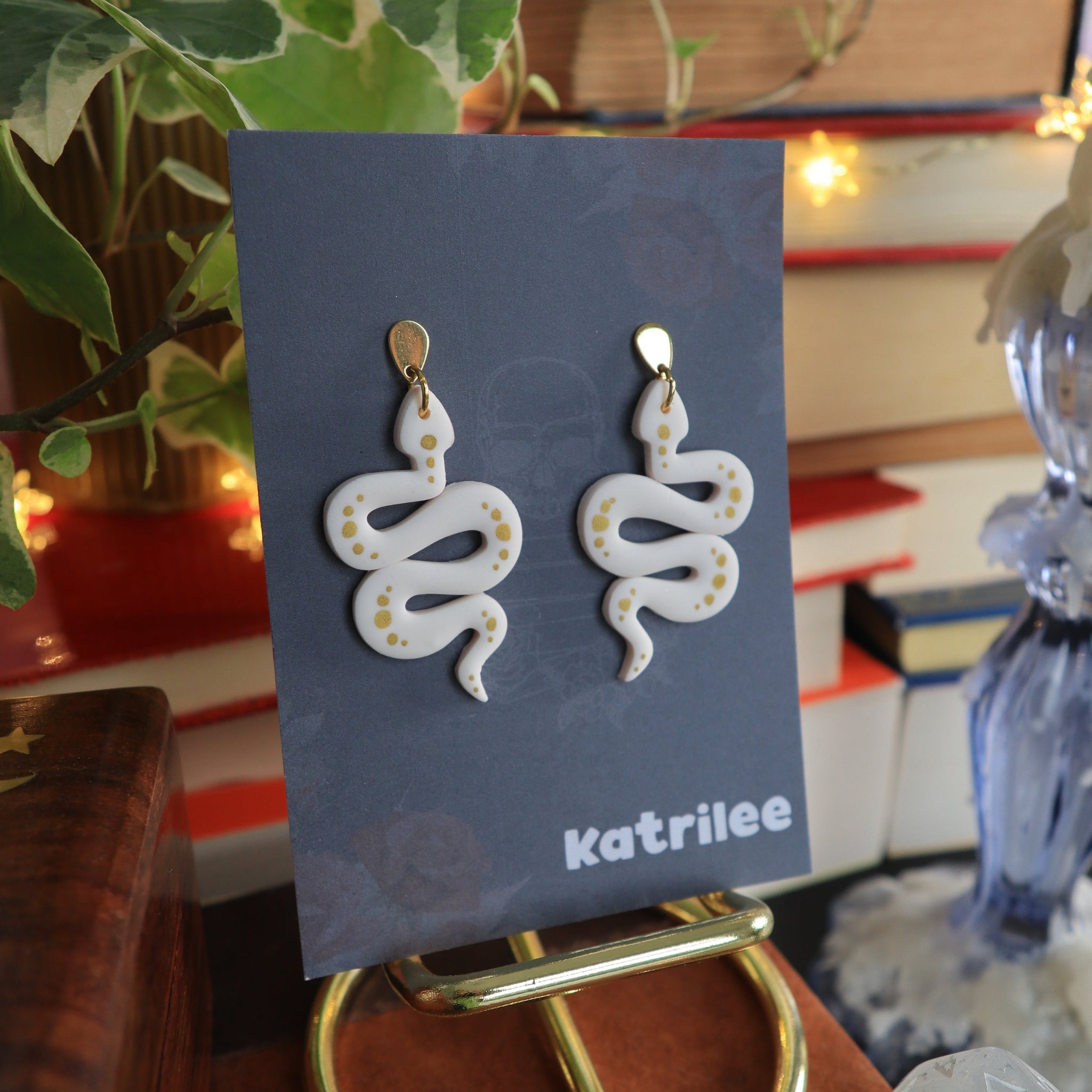 White and Gold Snake Earrings